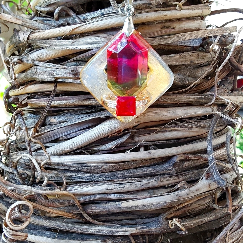 Ring artisan lab Created sapphire and 14k rose over 925 was zircons in resin